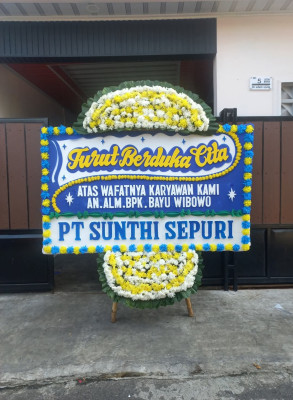 Papan Bunga Duka di Sinak Barat