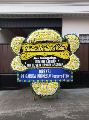 Papan Bunga Duka di Sinak Barat