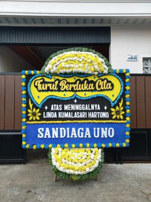Papan Bunga Duka di Sinak Barat